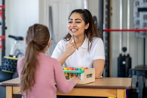 Girl with speech therapy Analyst in Arlington, VA, enjoying school-based ABA speech therapy in va